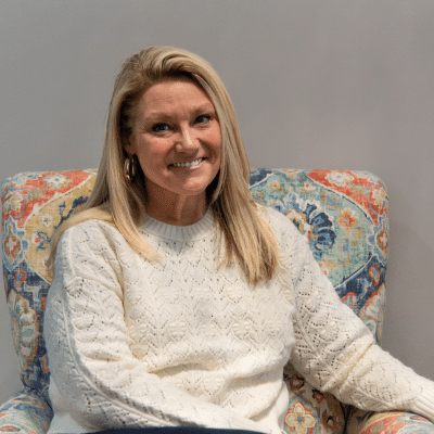 Woman sitting in a chair at star city medical, smiling, representing diabetes treatment in salem va